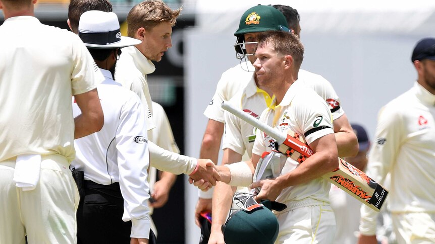 England captain Joe Root shakes hands with Australian batsman David Warner after Australia won on Day 5 at the Gabba.
