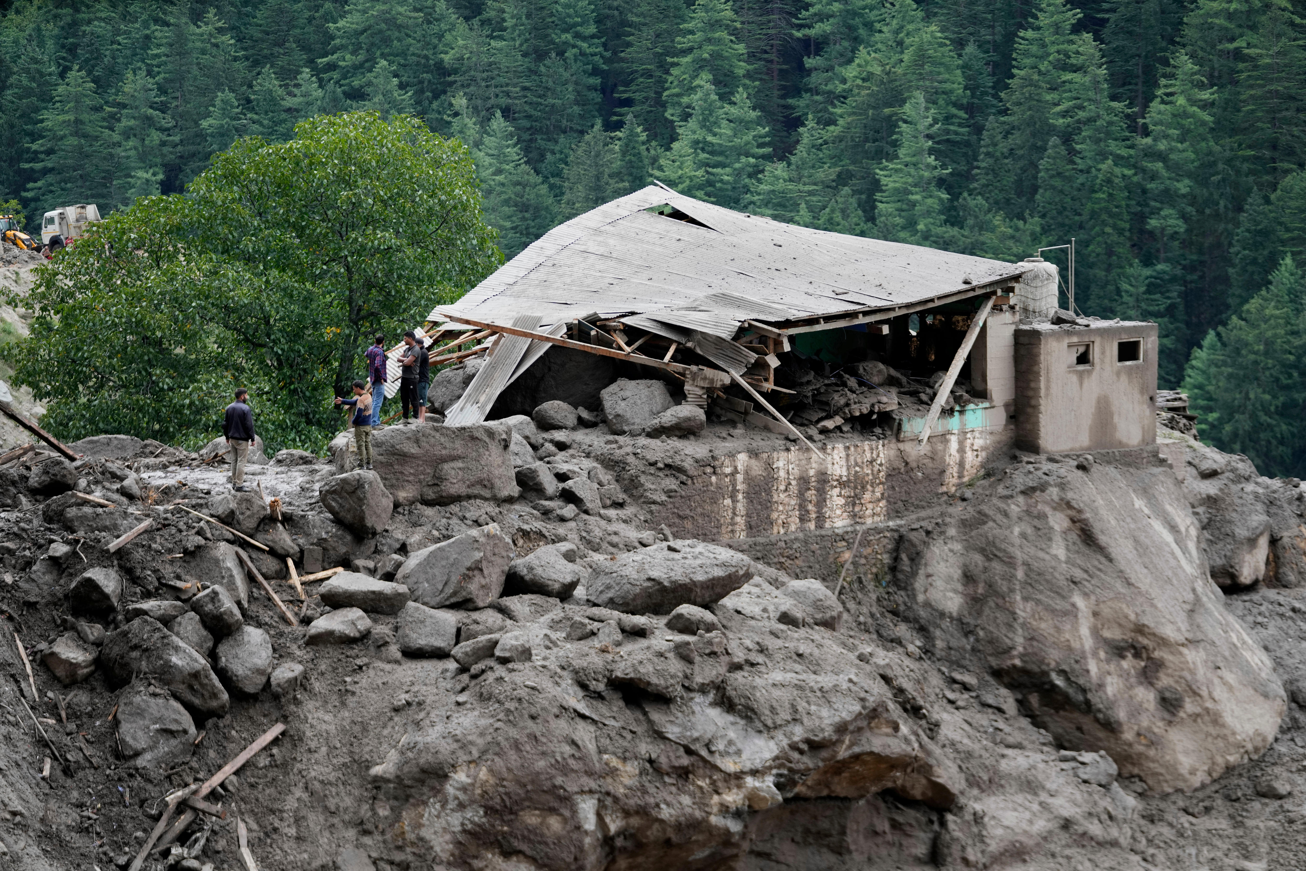 Helicopter crash site in mountainous Pakistan terrain