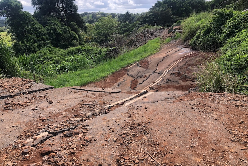 A road has fallen away because of a landslip