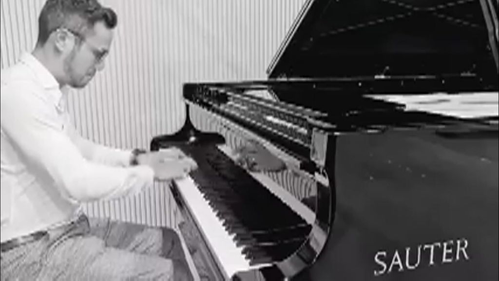 Stephen Cubis playing the piano. - ABC News