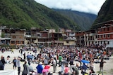 Tourists gather at a local stadium in Peru