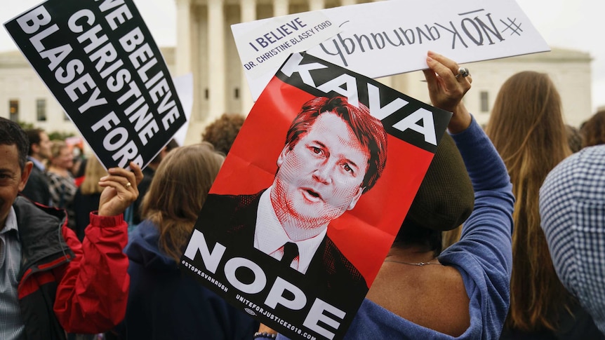 Protests against Brett Kavanaugh with sign "Kava-Nope"