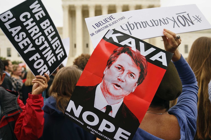 Protests against Brett Kavanaugh with sign "Kava-Nope"