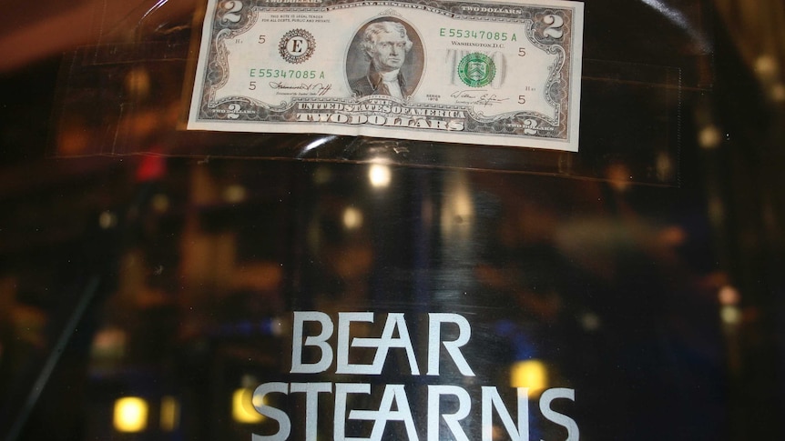 A $2 note stuck on the door of the Bear Sterns office after J.P. Morgan offered to buy the bank for $2 a share