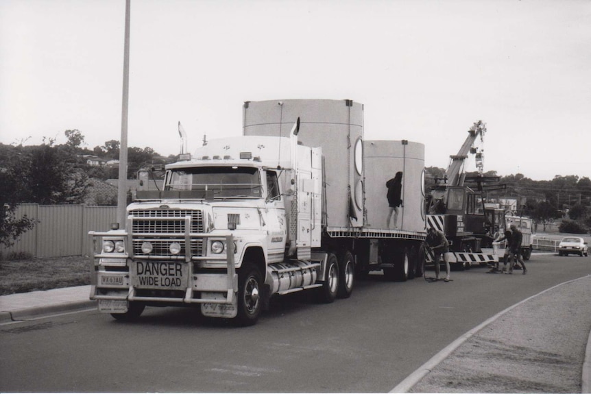 Concrete shelters onboard a truck in Kambah.