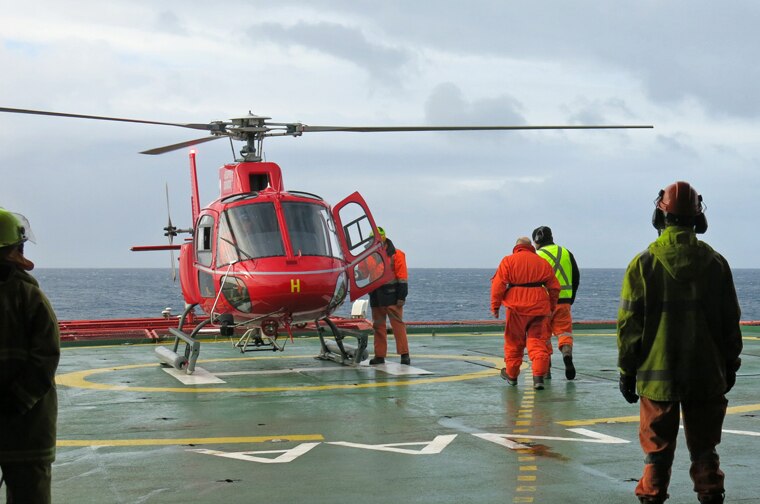Squirrel helicopters are used to unload cargo from the Aurora Australis.