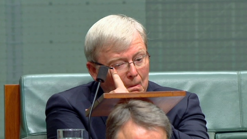 Kevin Rudd wipes a tear from his eye as Bronwyn Bishop speaks after Mr Rudd announced his retirement.