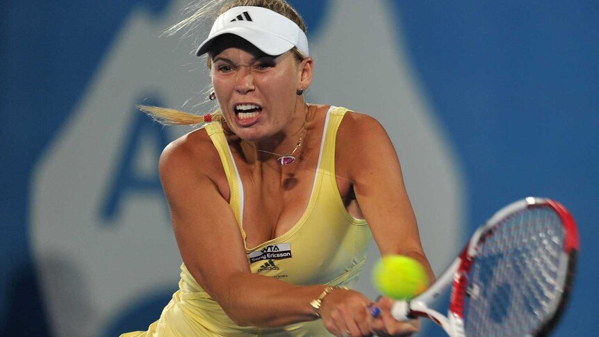 Wozniacki plays a shot in Sydney