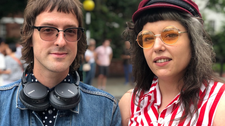 A couple dressed in 60s clothing
