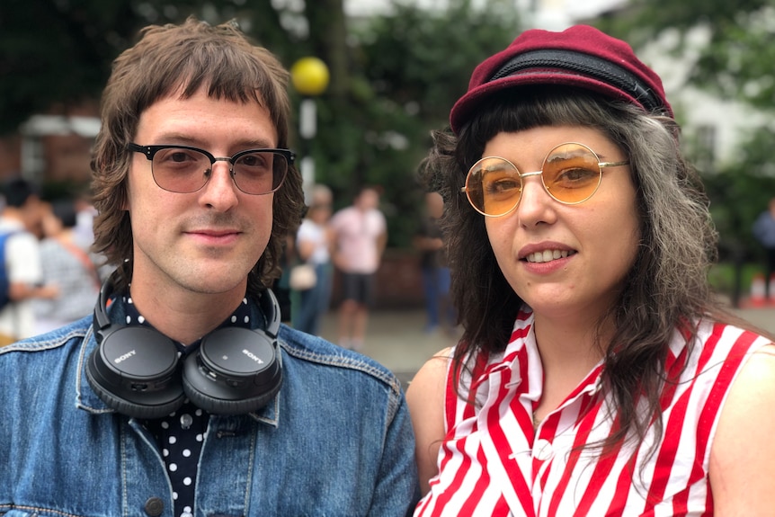 A couple dressed in 60s clothing