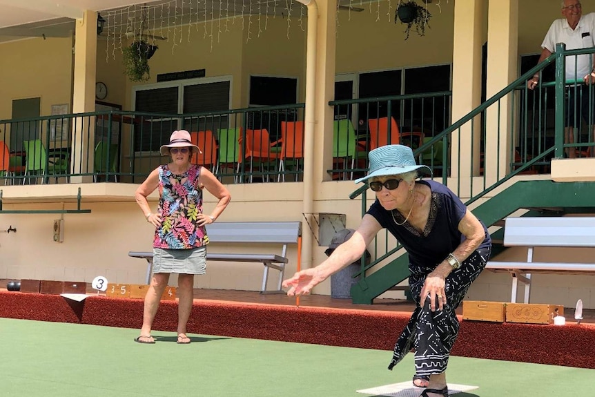 Two women on a bowling green