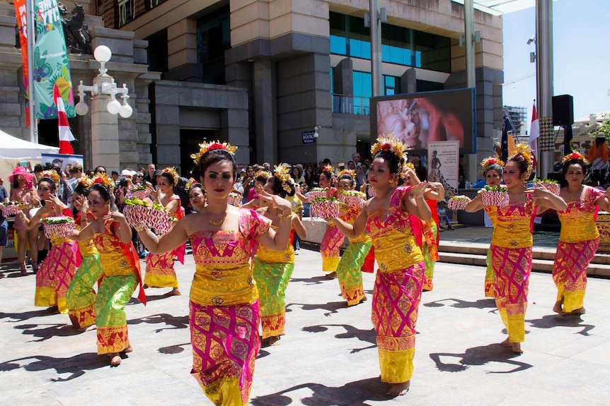A group of Balinese female dancers performing