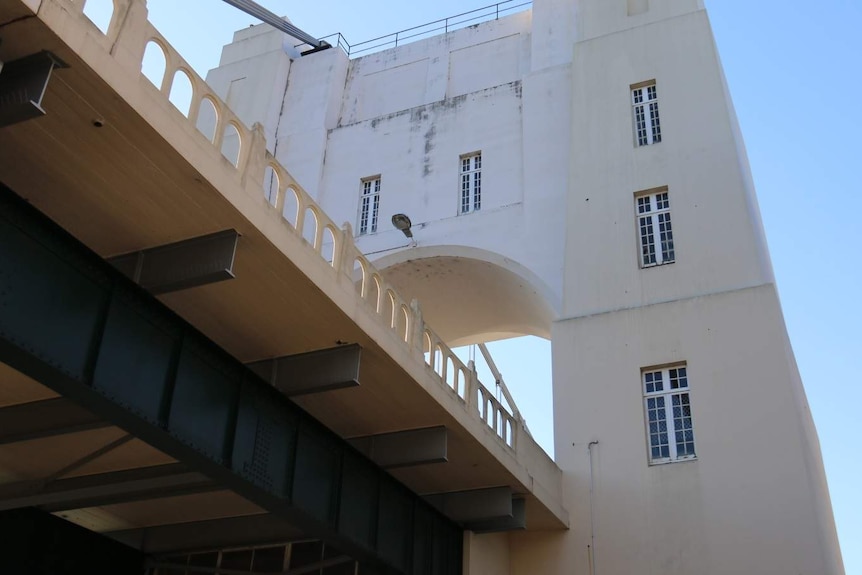View from underneath the bridge looking up to the pylon apartment