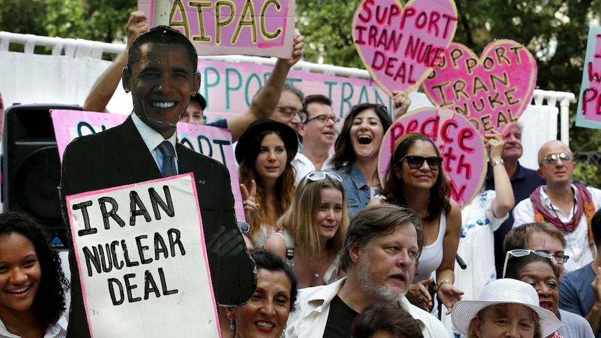Anti-war activists rally outside the White House in Washington in support of the Iran nuclear deal