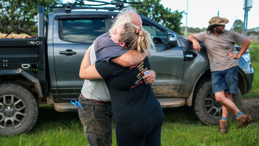 Peter and harmony hug