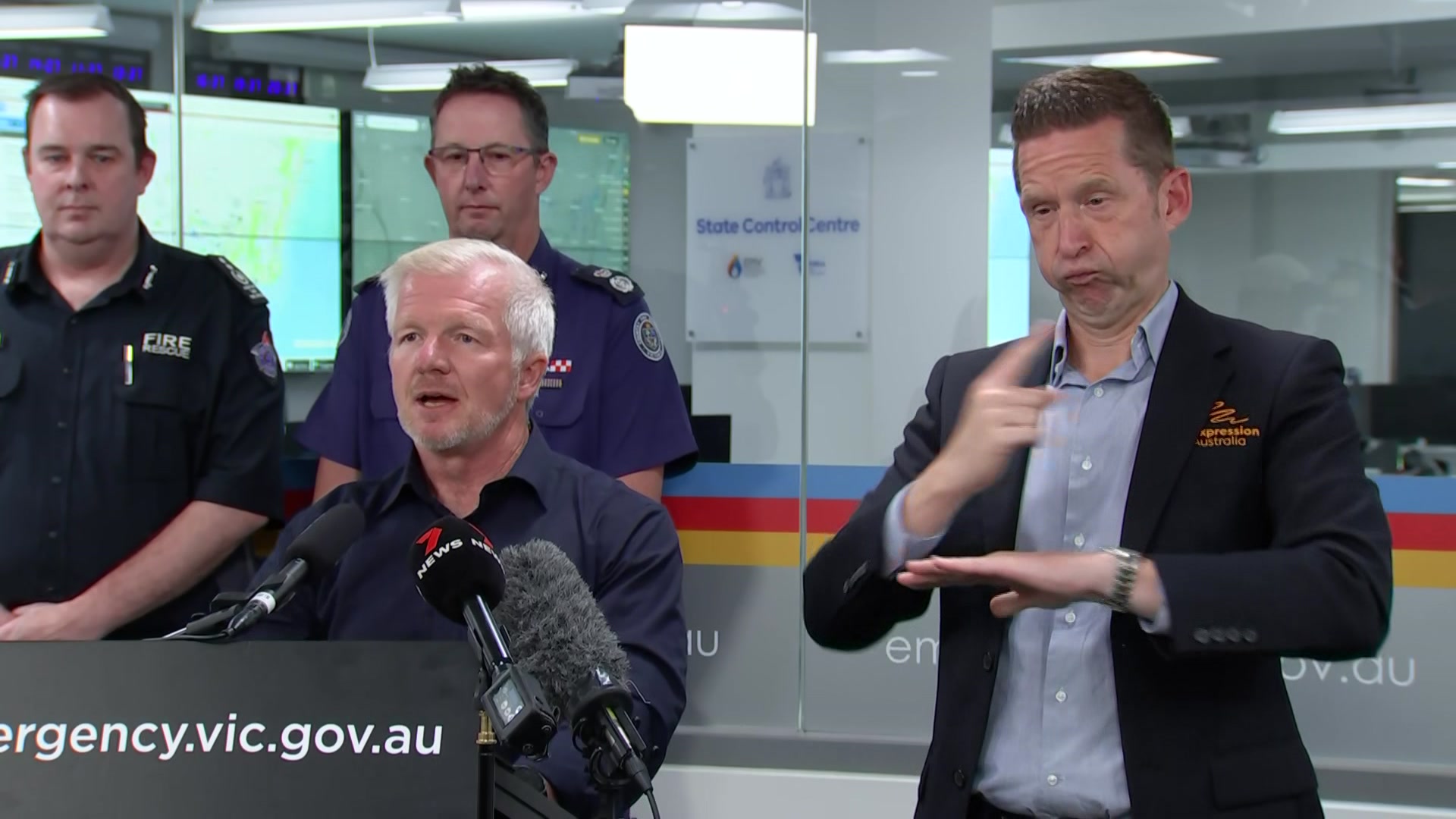 A man standing at a press conference