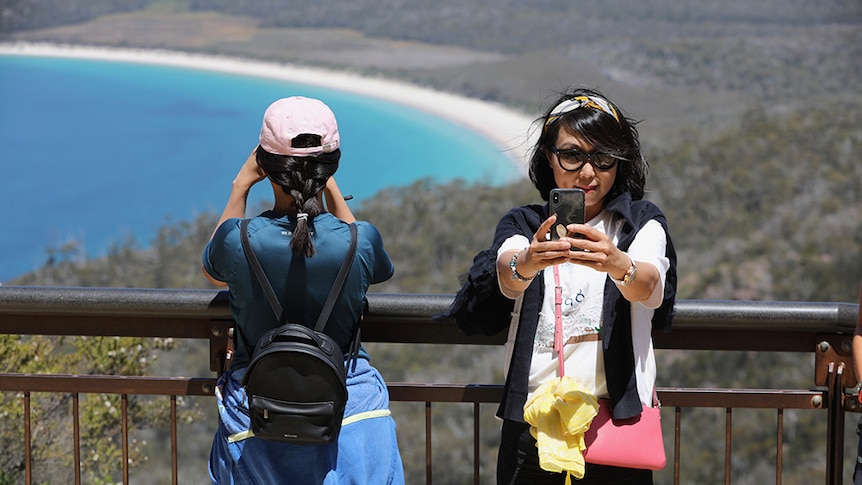 Asian tourists at Wineglass Bay