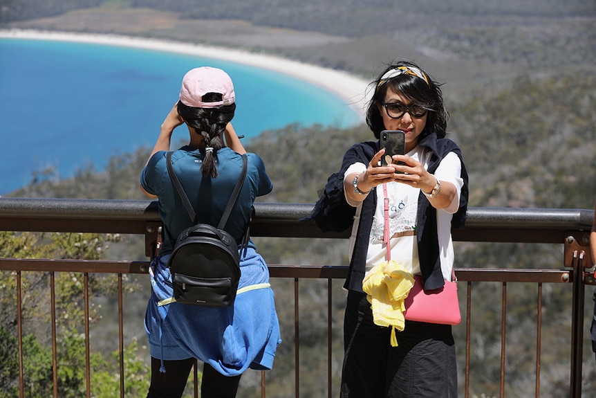 Tourists at Wineglass Bay