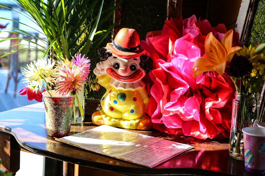 Flowers and clown ornament