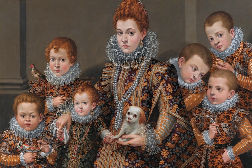 Historic painting of family of redhead children in matching ornate clothes with their noble mother