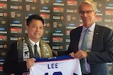 Newcastle Jets owner, Martin Lee (left) with FFA CEO David Gallop