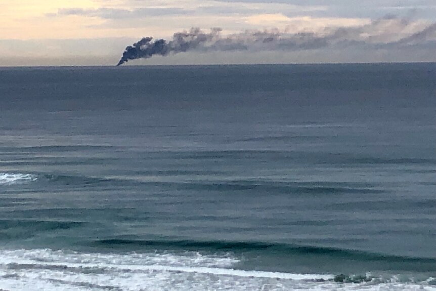 A black plume of smoke from the fire could be seen from the shore.