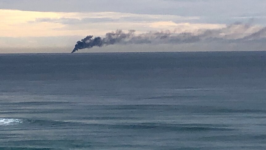 A black plume of smoke from the fire could be seen from the shore.