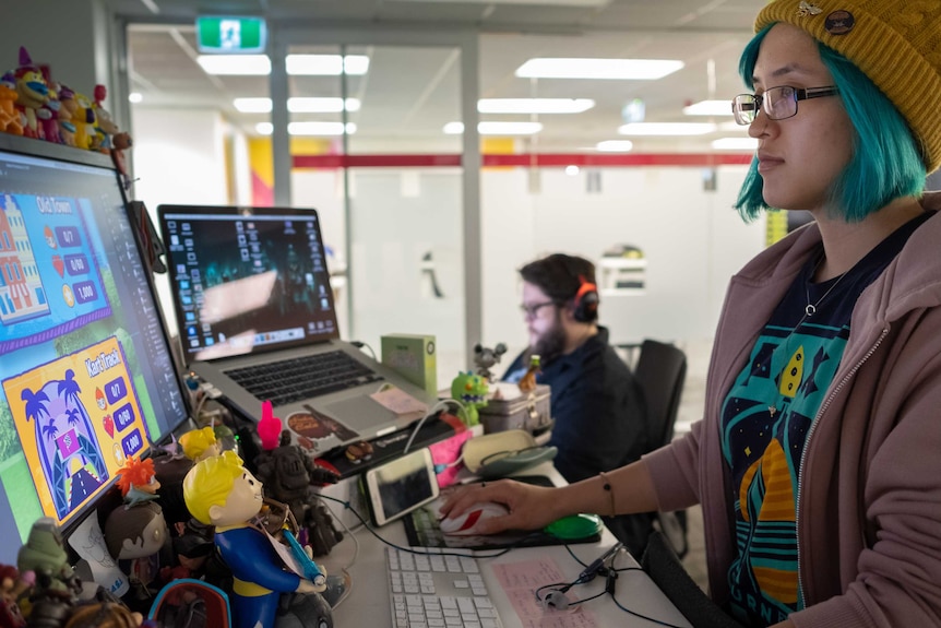 An employee working at her desk