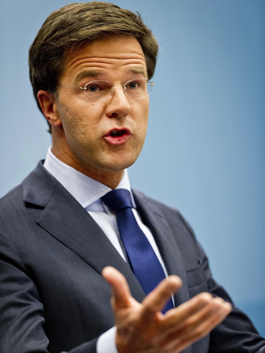 Mark Rutte gestures during a press conference.