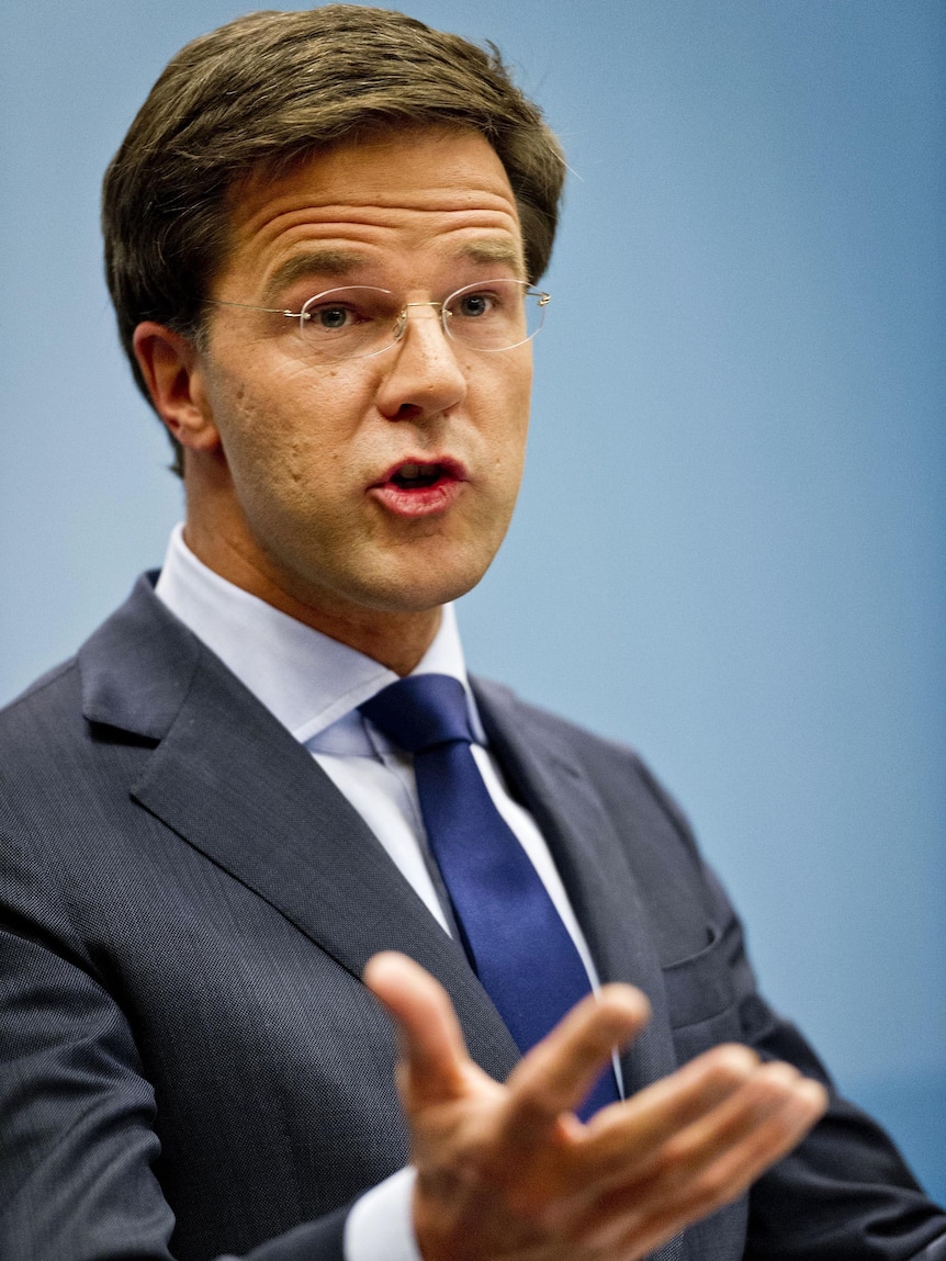 Mark Rutte gestures during a press conference.
