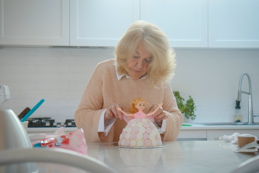 Children's Birthday Cake Book author Pamela Clark making a cake.