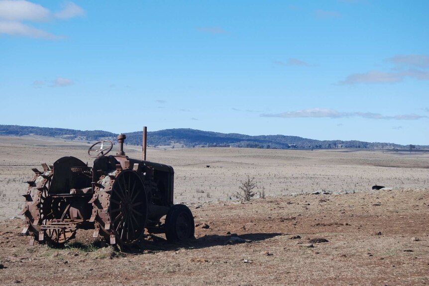 Tractor on drought-ravaged farm in Guyra, NSW.