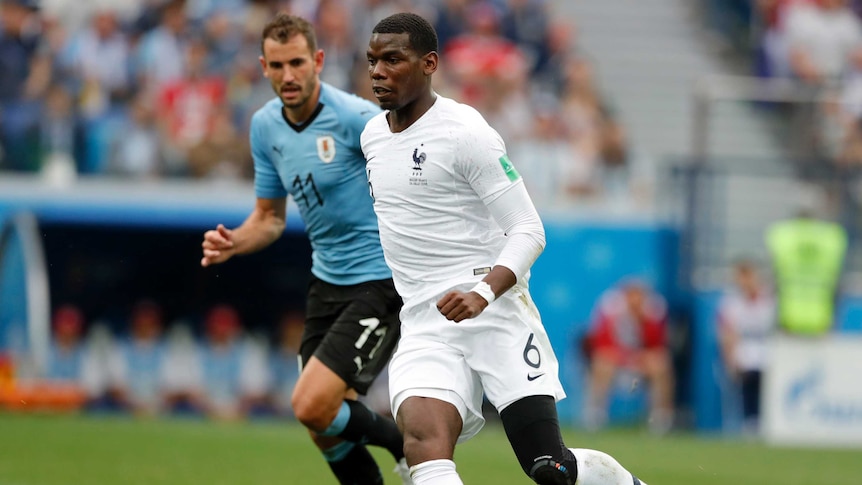France's Paul Pogba plays the ball against Uruguay