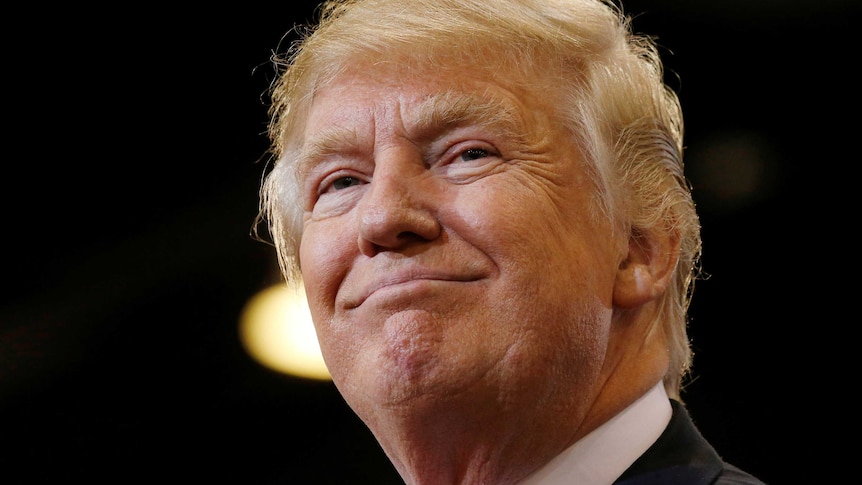 Donald Trump smiles during a campaign even in Phoenix, Arizona.