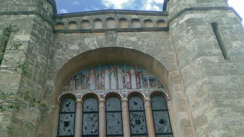 The smashed in windows of Winthrop Hall at the University of Western Australia