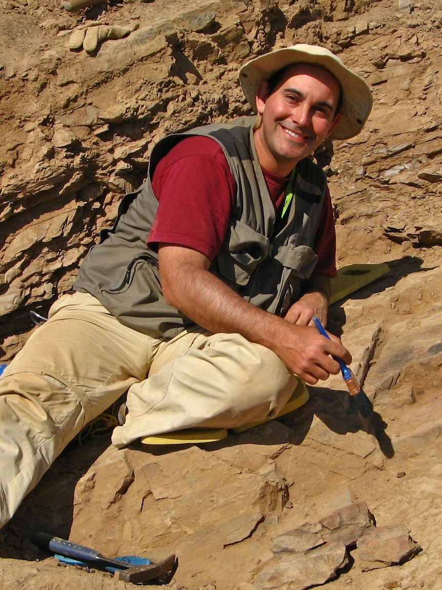 Dr Diego Garcia-Bellido inspects a fossil bed.