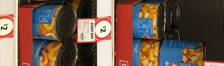 Coles brand SPC canned fruit on supermarket shelves