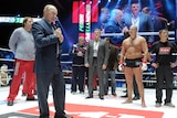 Vladimir Putin was drowned out by boos and whistles at the bout in Moscow.