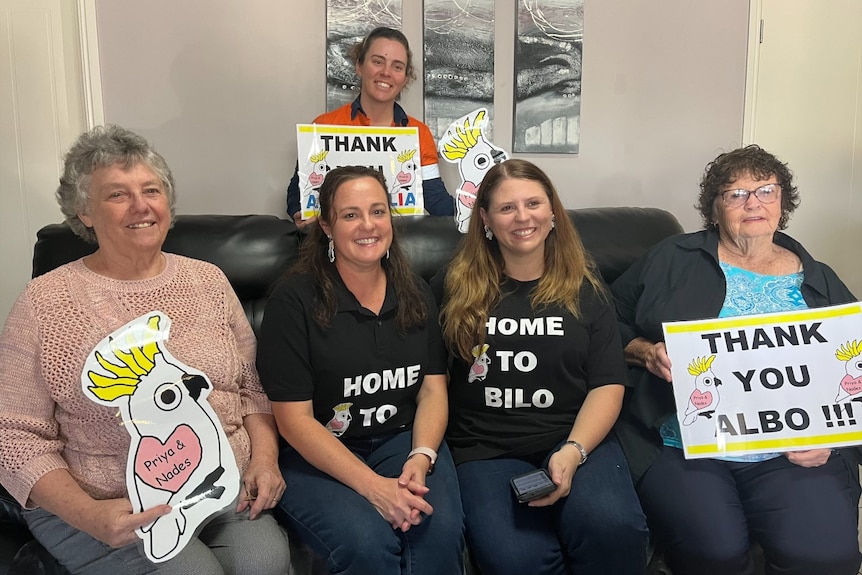 Supporters smile with t-shirts that read "thank you Albo"