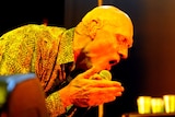 Slick set: Environment Minister Peter Garrett performs with Midnight Oil in Canberra.