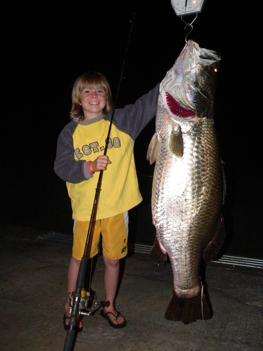 Nine-year-old Riley Vallance with his big barramundi catch.