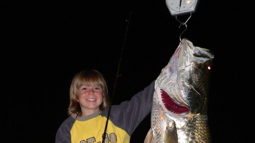 Nine-year-old Riley Vallance with his big barramundi catch.