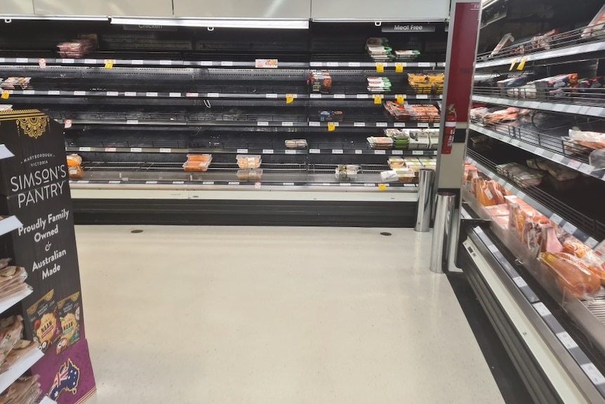 a meat shelf that's almost empty