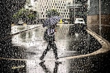 a man under an umbrella