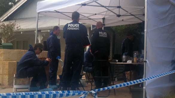 Forensic police at a house in South Fremantle