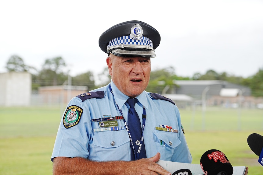 A police officer speaks during a media conference.