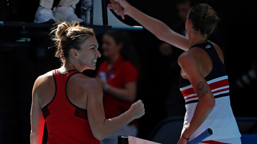 Romania's Simona Halep (L), celebrates after beating Karolina Pliskova at the Australian Open.