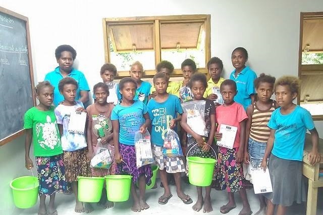 Mamma's Laef volunteers with some of the girls in Tanna
