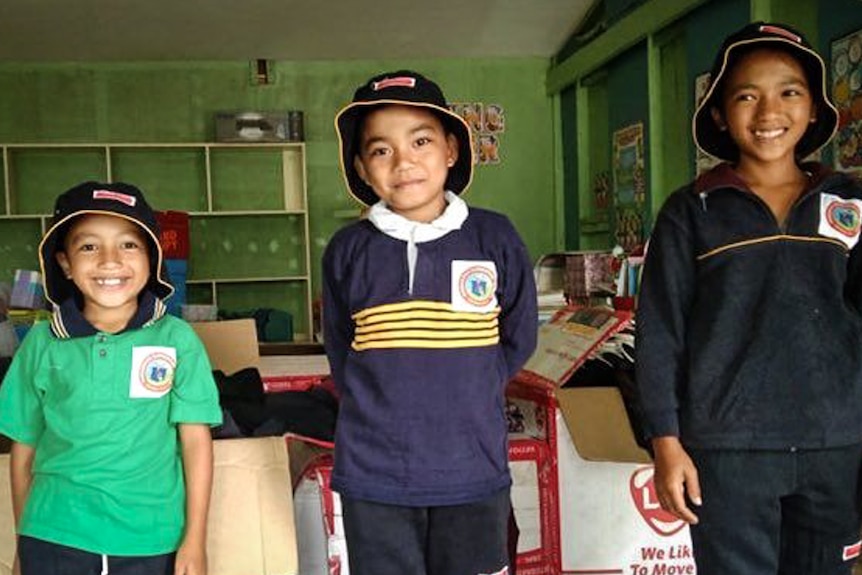 Four Pangamihan Elementary School students donning their sports uniforms.