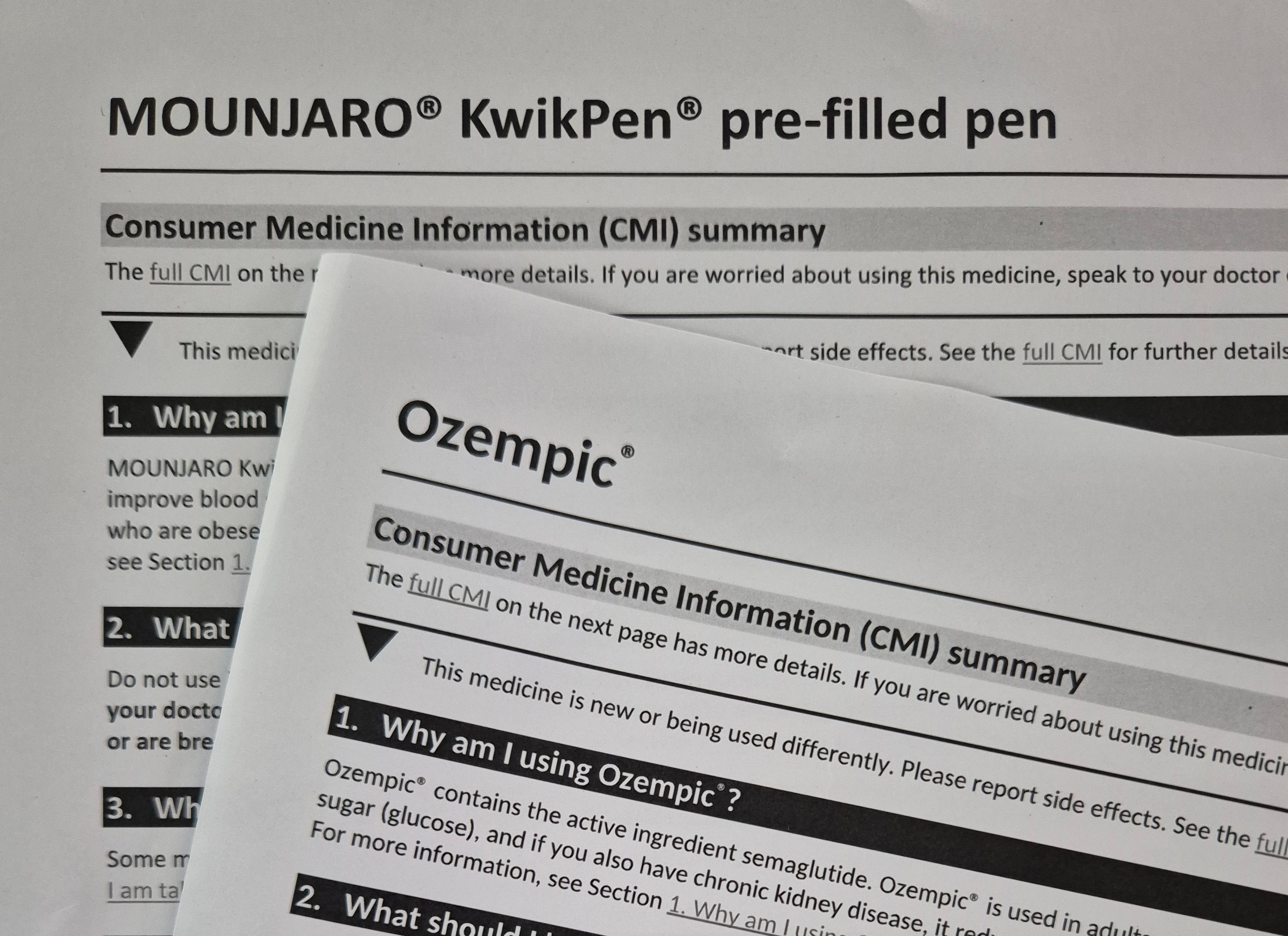 A small black triangle can be seen on product information for two drugs.